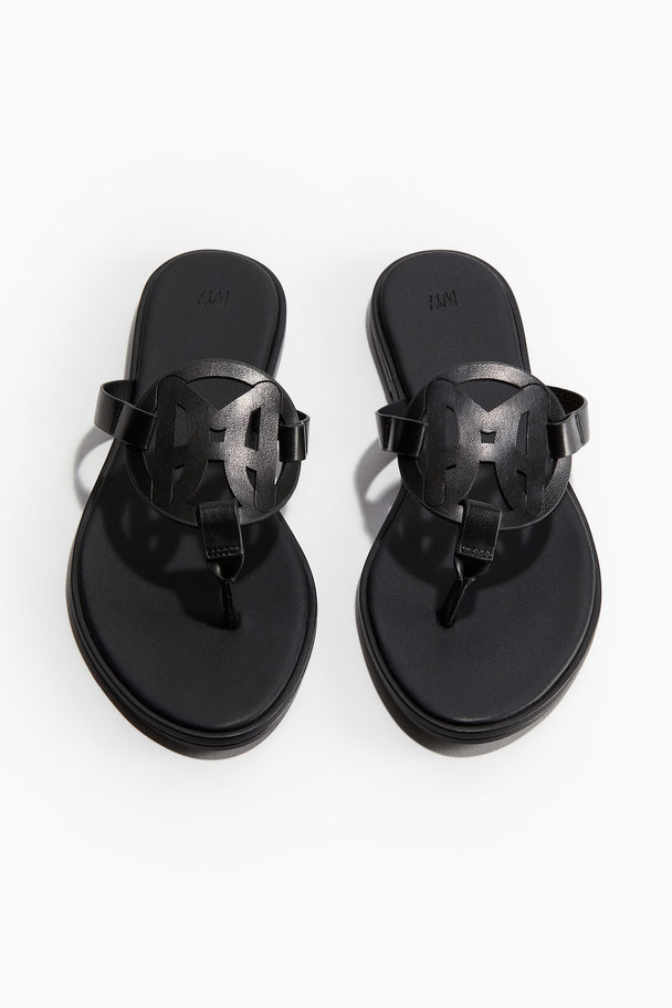 H&M Zehensandalen mit Monogramm Schwarz