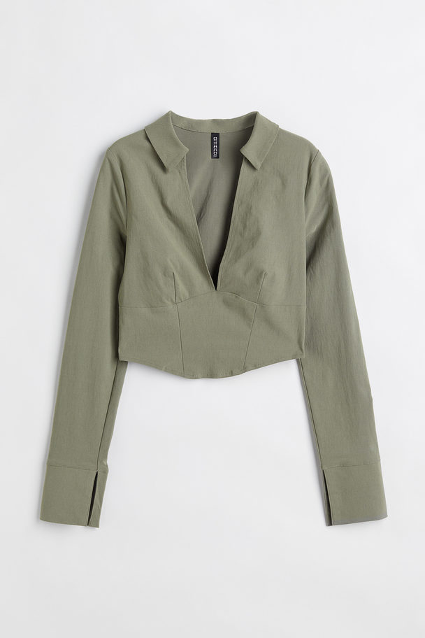 H&M Bluse mit V-Ausschnitt im Korsagen-Look Khakigrün