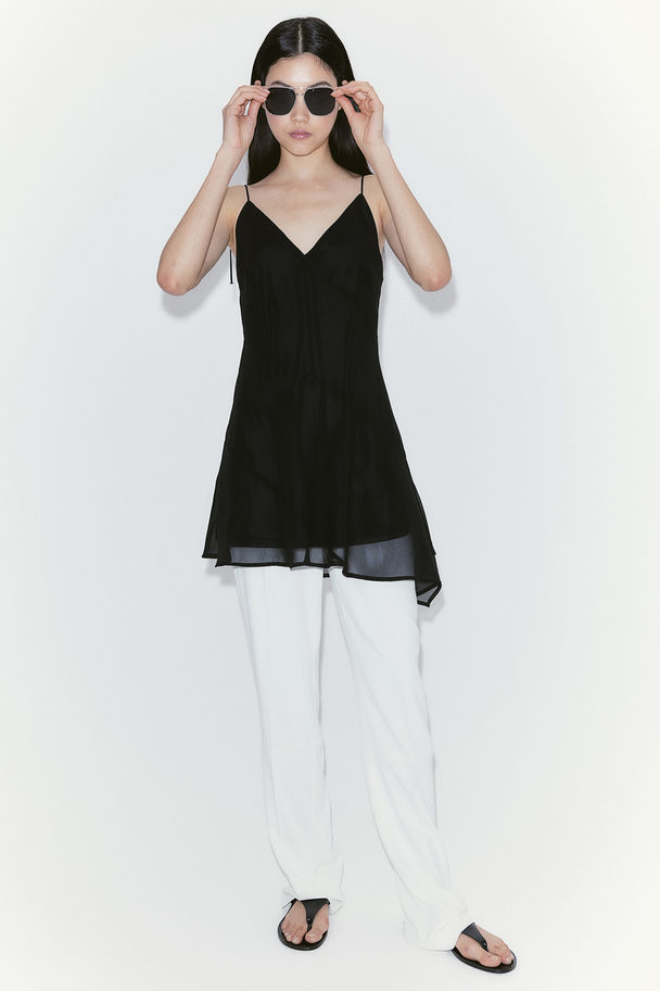 H&M Asymmetrisches Kleid aus zartem Webstoff Schwarz