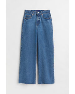 Wide High Ankle Jeans Dunkelblau