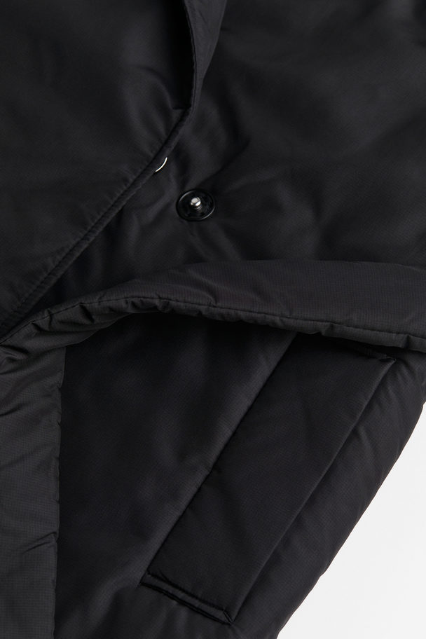 H&M Wattierter Mantel mit Bindegürtel Schwarz