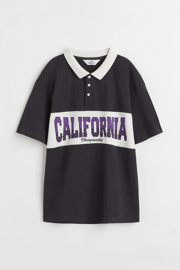 H&M Poloshirt mit Print Schwarz/California