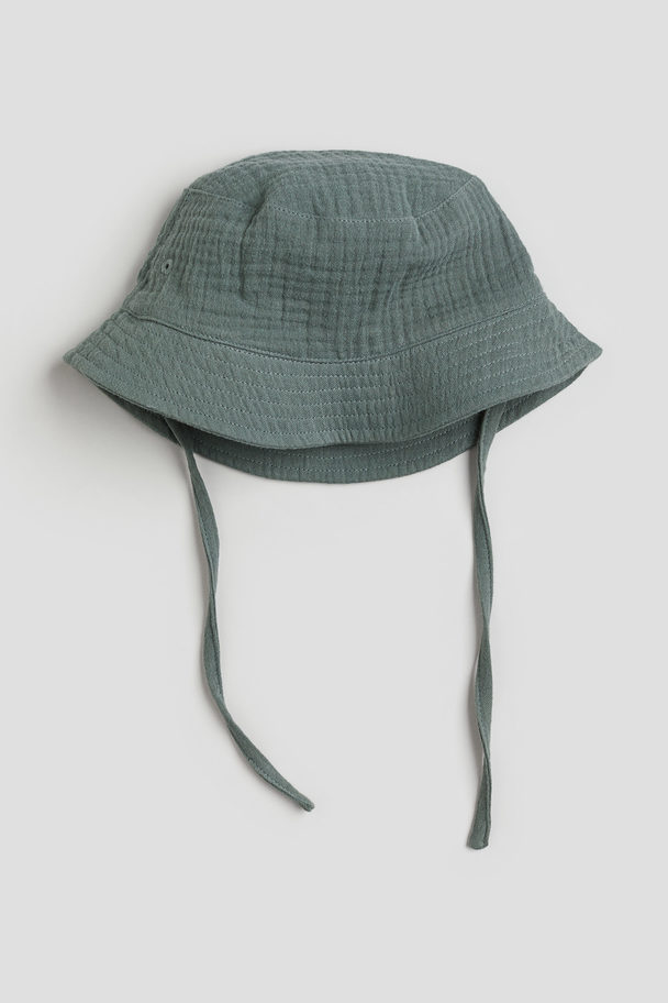 H&M Bucket Hat aus Baumwollmusselin Dunkelgrün