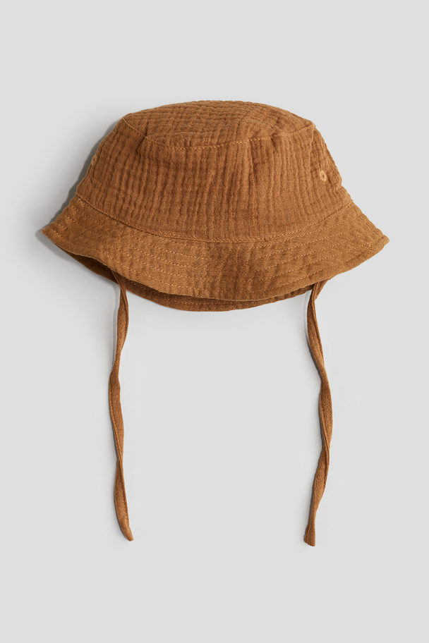 H&M Bucket Hat aus Baumwollmusselin Braun