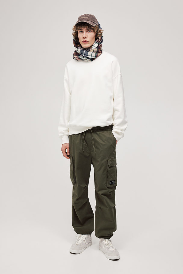 H&M Cargo-Joggpants aus Baumwolle Relaxed Fit Khakigrün