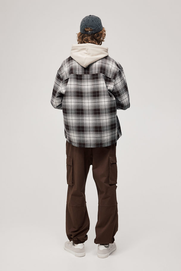 H&M Cargo-Joggpants aus Baumwolle Relaxed Fit Dunkelbraun