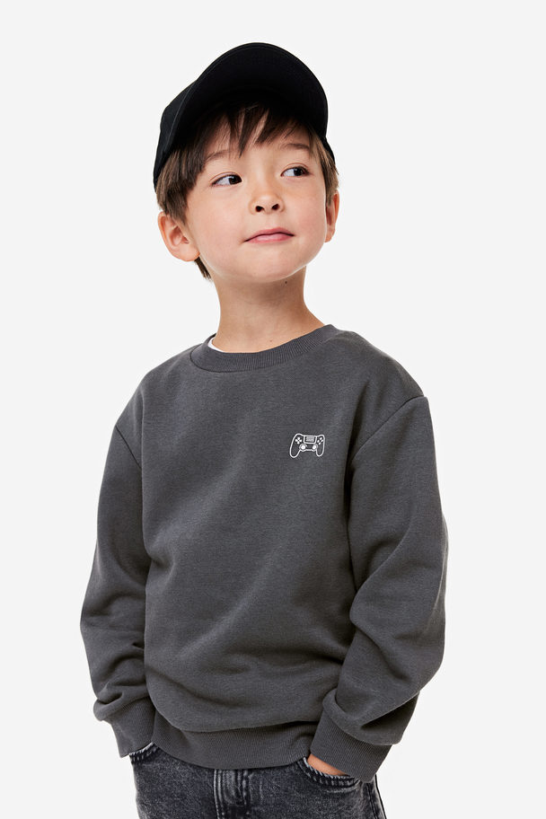 H&M Sweater Donkergrijs/gamecontroller