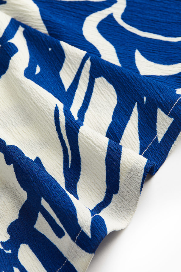 H&M Neckholder-Kleid in A-Linie Weiß/Blau gemustert