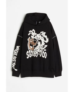 Oversized Hoodie mit Print Schwarz/Scooby-Doo