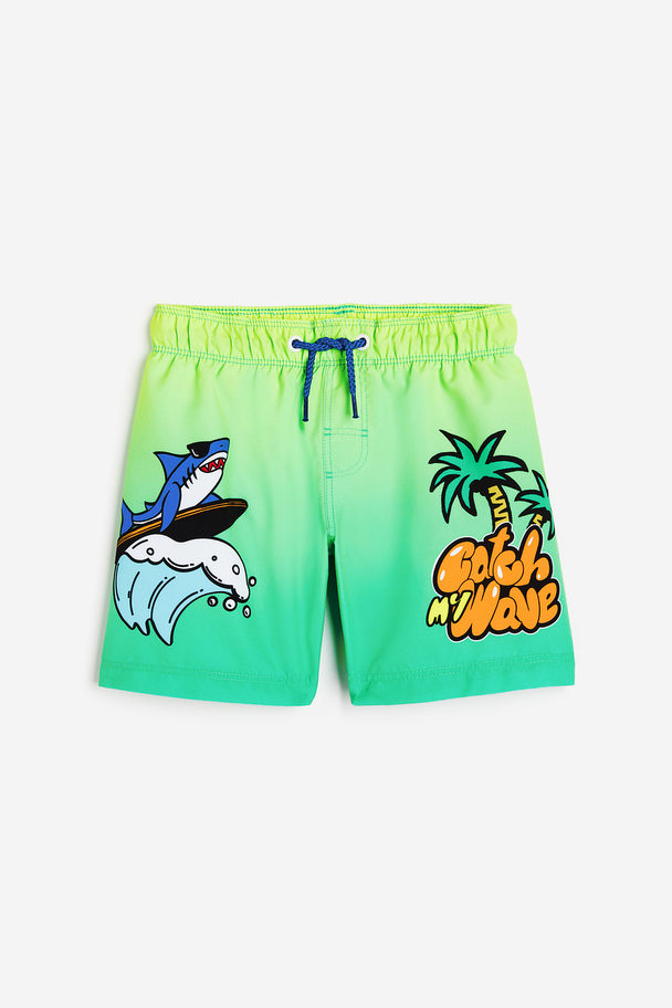 H&M Gemusterte Badeshorts Neongrün/Surfender Hai