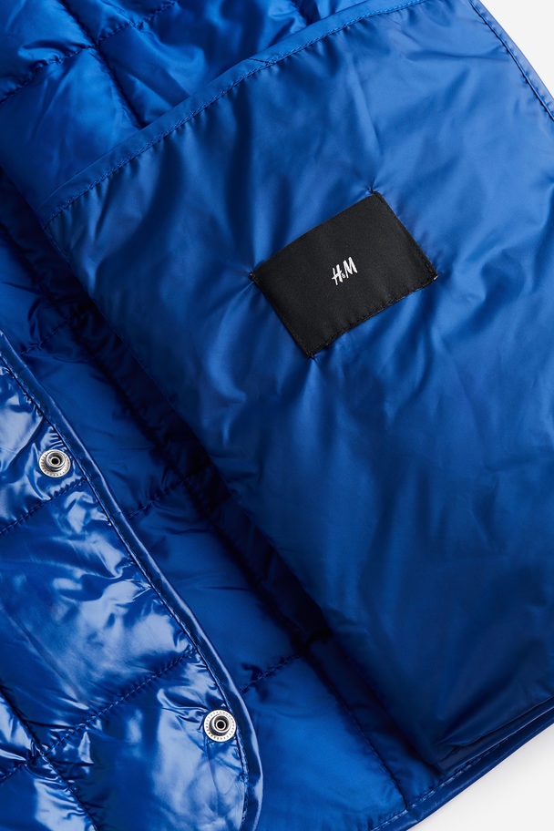 H&M Gewatteerde Bodywarmer - Slim Fit Helderblauw