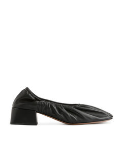 Lederballerinas mit Absatz Schwarz