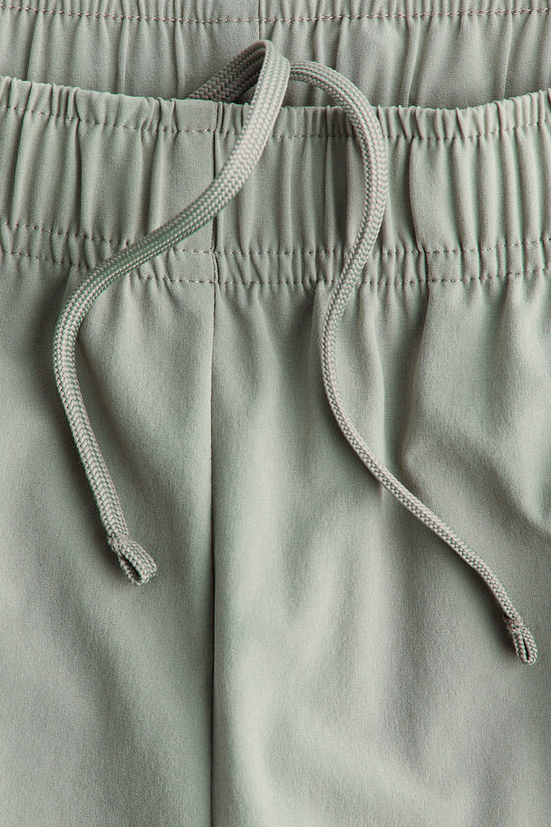 H&M Drymove™ Sports Shorts Light Khaki Green