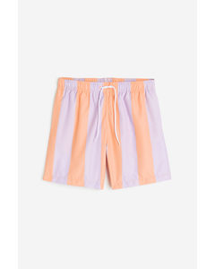 Gemusterte Badeshorts Orange/Lila gestreift