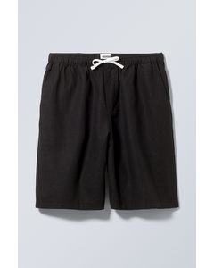 Patrik Loose Linen Shorts Svart