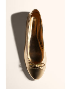 Ballerinas Goldfarben