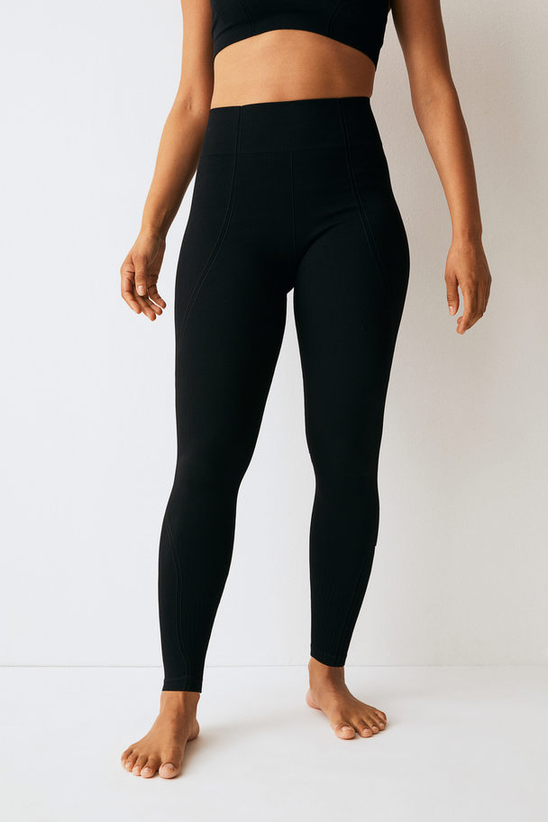 H&M DryMove™ Nahtlose Sportleggings Schwarz