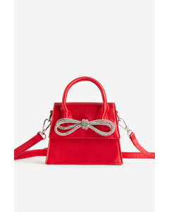 Indy  Bow Minibag In Rot-diamant Lack Rot
