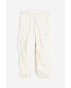 Low-waisted Parachute Trousers Cream