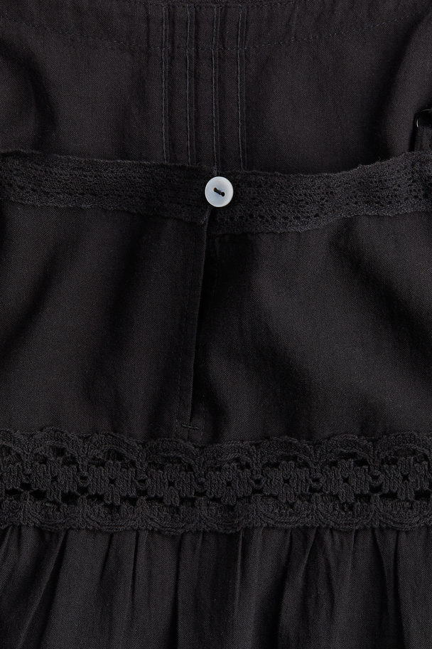 H&M Baumwollkleid mit Spitzenborten Schwarz