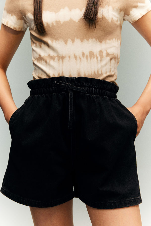 H&M Paperbag-Shorts aus Denim Schwarz