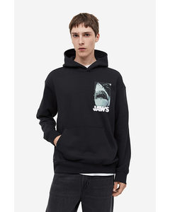 Hoodie Relaxed Fit Schwarz/Jaws