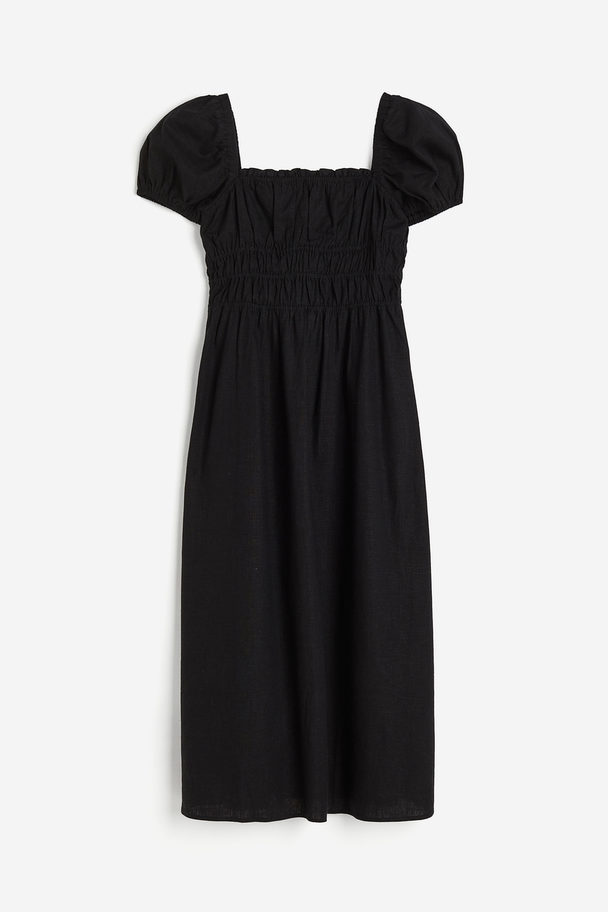 H&M Kleid mit gesmokter Taille aus Leinemix Schwarz