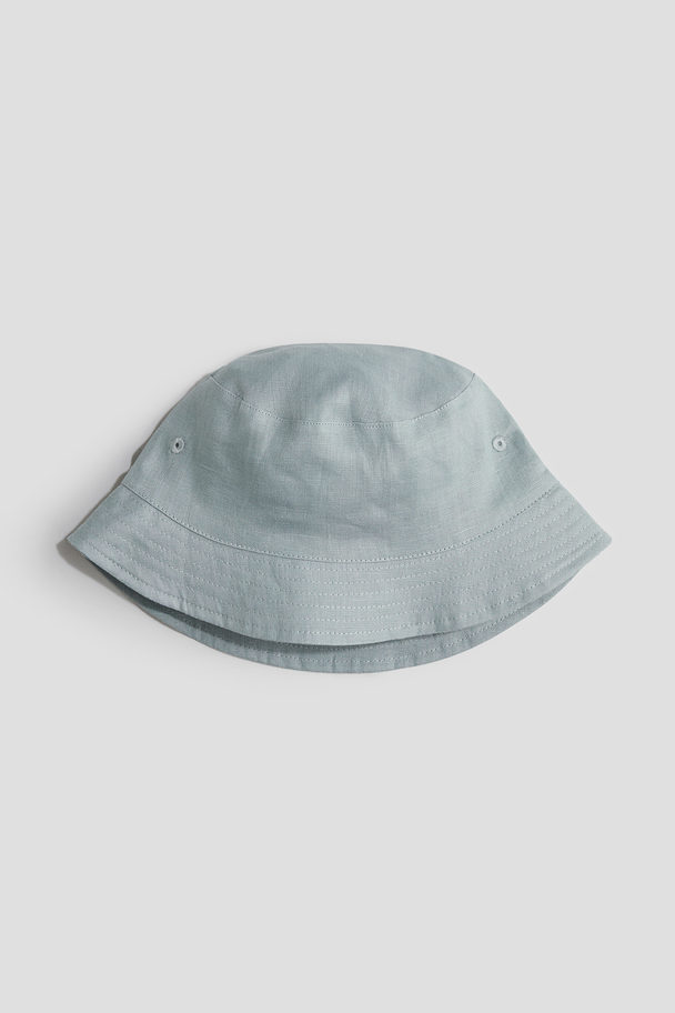 H&M Bucket Hat aus Leinen Helles Matttürkis