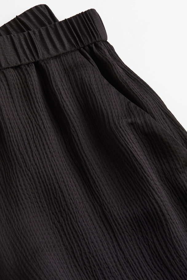 H&M Shorts aus Seidenmischung Schwarz