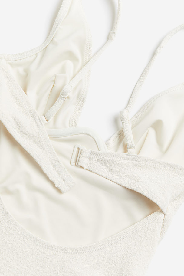 H&M Badeanzug mit Bügelcups und hohem Beinausschnitt Weiß