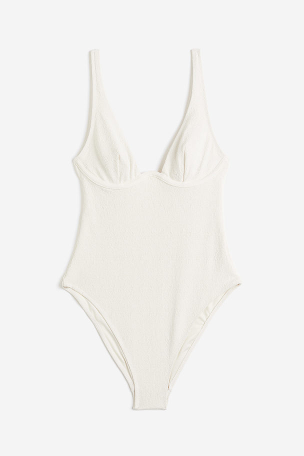 H&M Badeanzug mit Bügelcups und hohem Beinausschnitt Weiß