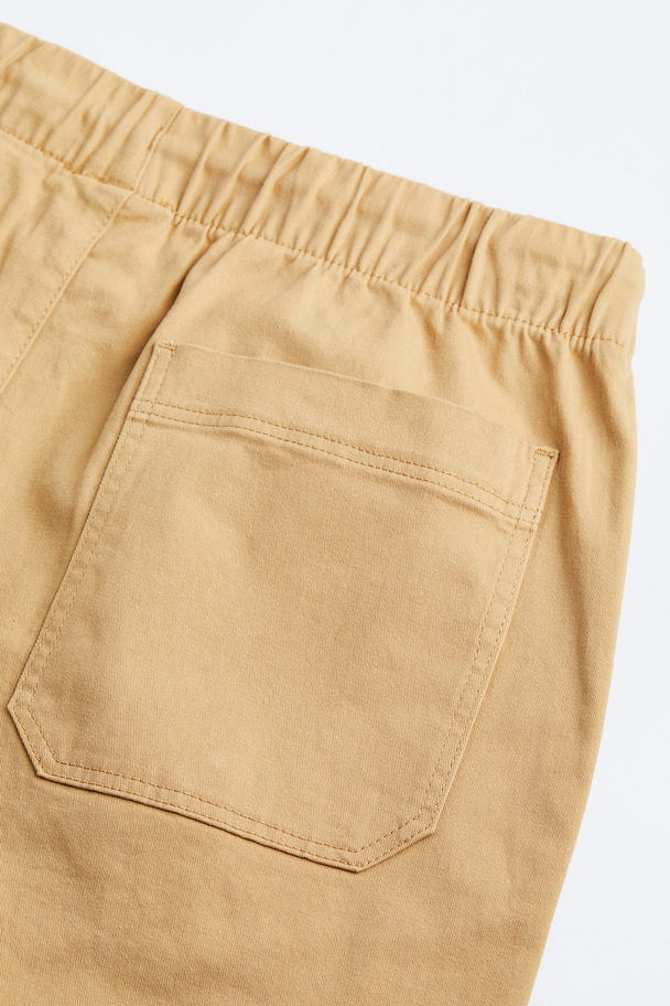 H&M Regular Fit Cotton Twill Pull-on Trousers Beige