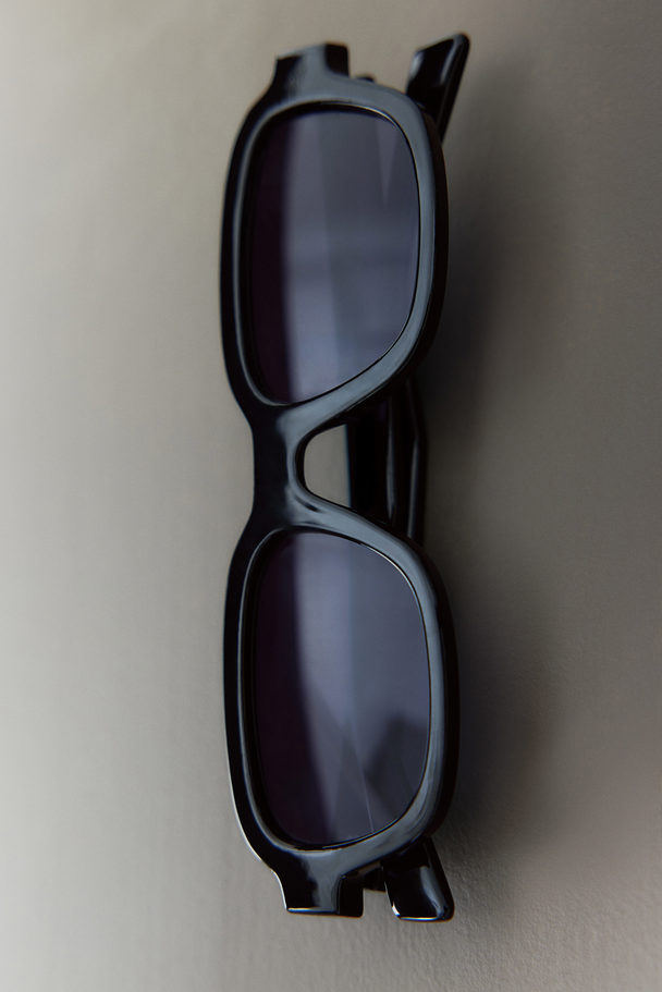 H&M Ovale Sonnenbrille Schwarz