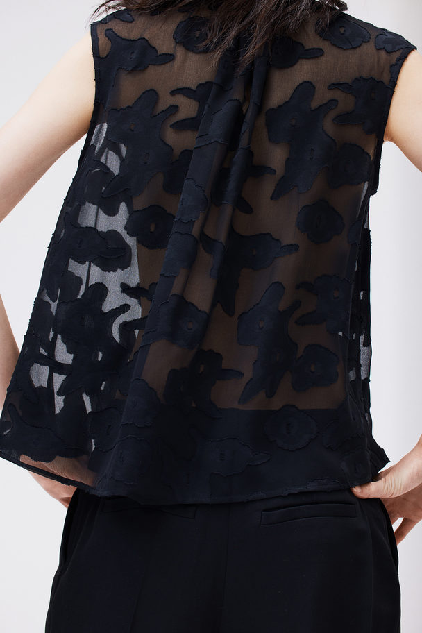 H&M Ärmellose Bluse aus Jacquardstoff Schwarz