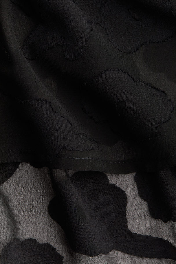 H&M Ärmellose Bluse aus Jacquardstoff Schwarz