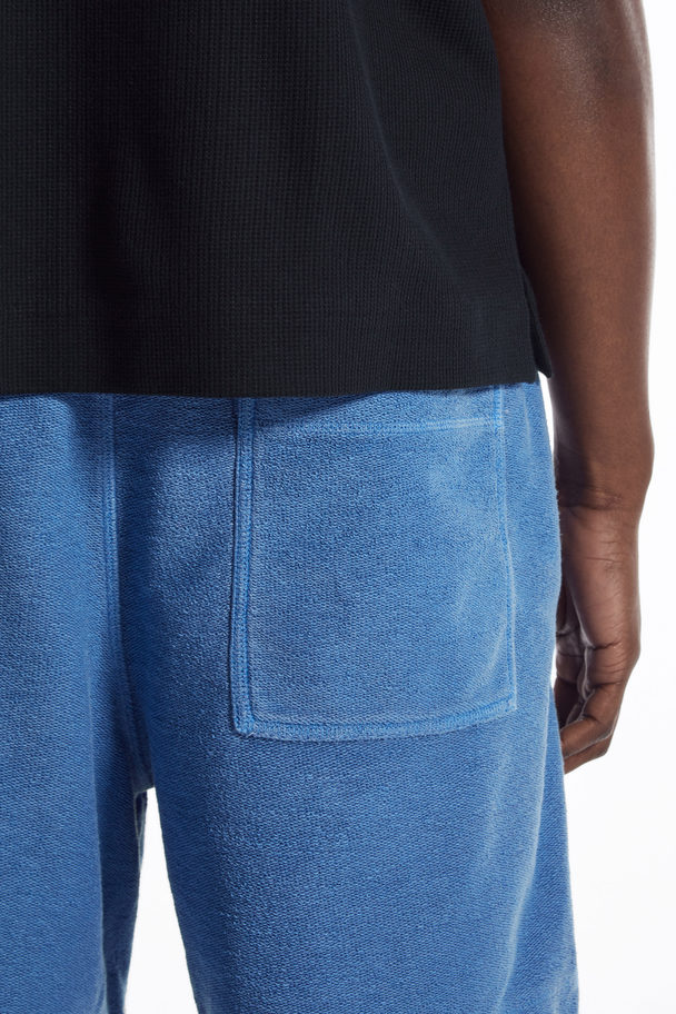 COS SHORTS MIT KORDELZUGBUND AUS FROTTEE Blau