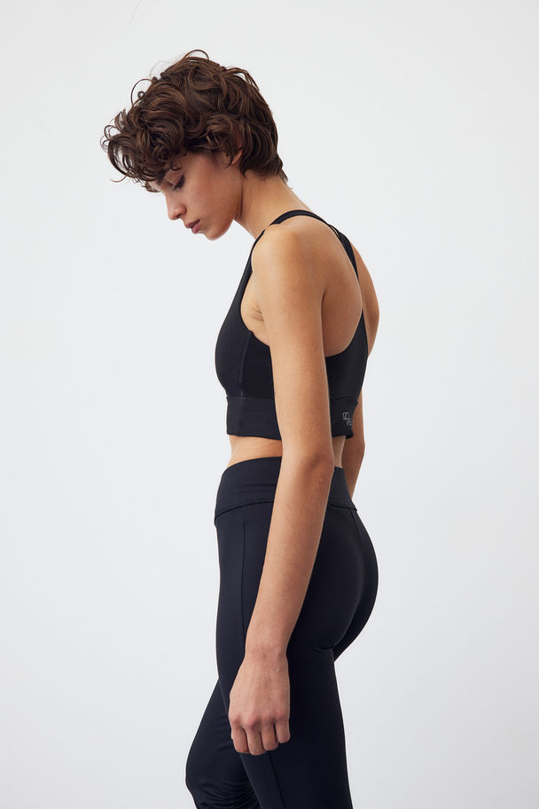 H&M SoftMove™ Ausgestellte Sportleggings Schwarz