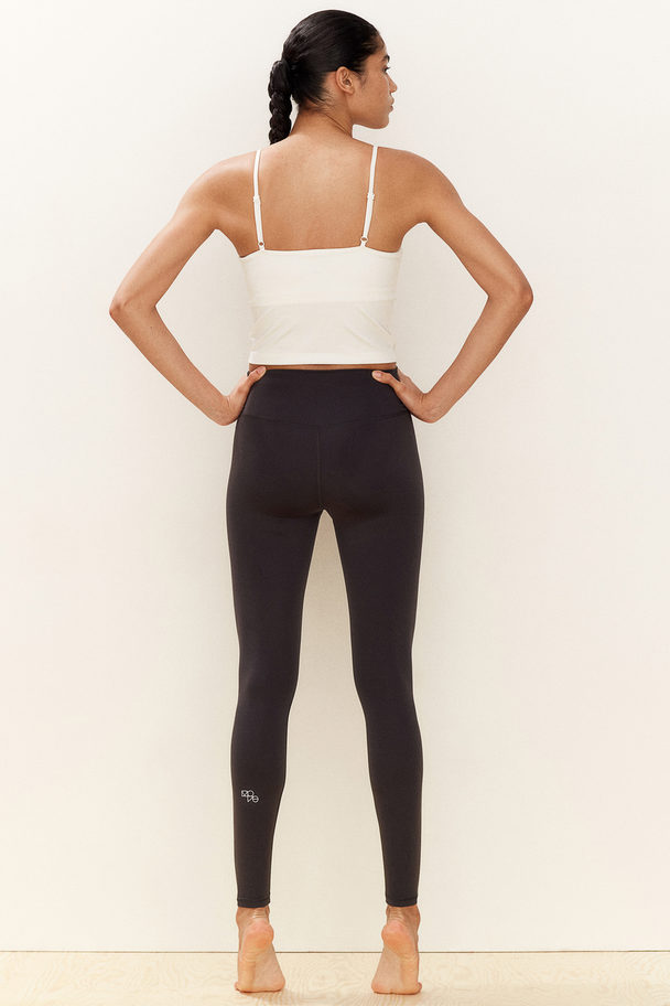 H&M SoftMove™ Sportleggings Graumeliert