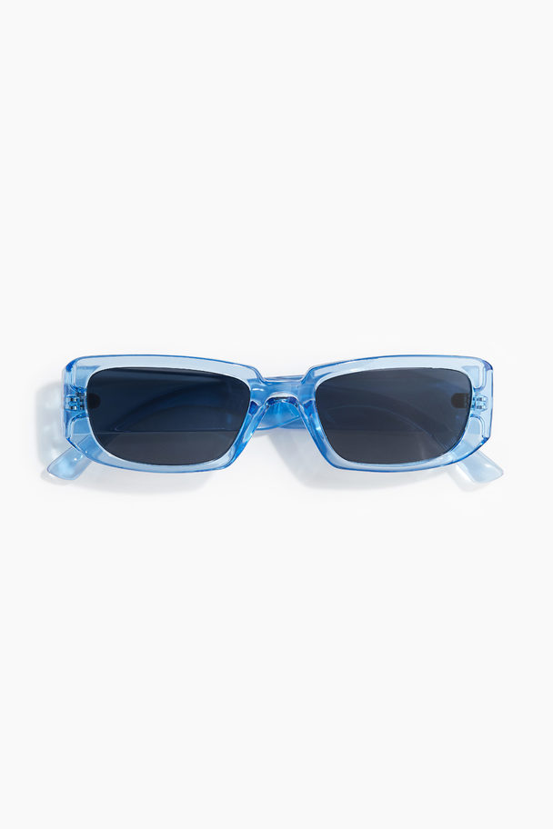 H&M Ovala Solglasögon Ljusblå