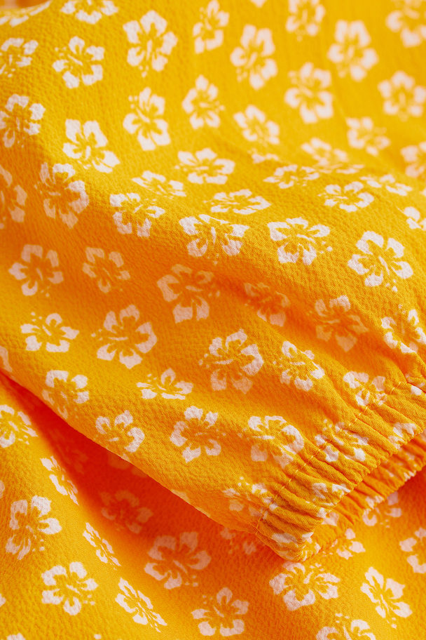 H&M H&m+ Crêppad Off Shoulder-klänning Orange/småblommig