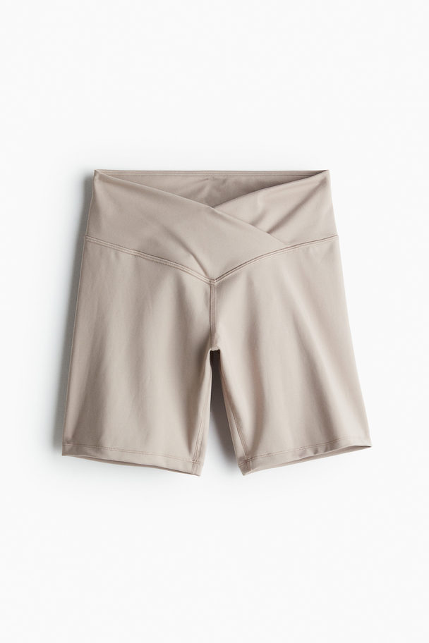 H&M DryMove™ Sport-Radlershorts Hellbeige