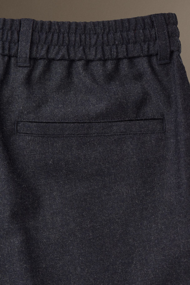 COS Elasticated Wool-flannel Trousers - Tapered Navy Mélange