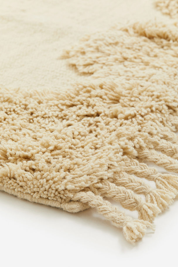 H&M HOME Getufteter Teppich aus Wollmix Hellbeige