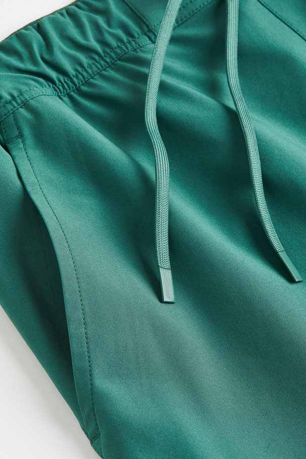 H&M DryMove™ Tennisshorts Dunkelgrün