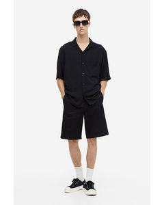 Chino-Shorts in Relaxed Fit Schwarz