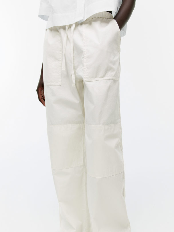 ARKET Hose aus gewaschener Baumwolle Cremeweiß