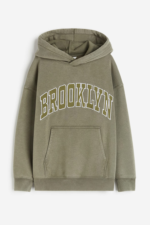 H&M Capuchonsweater Kakigroen/brooklyn