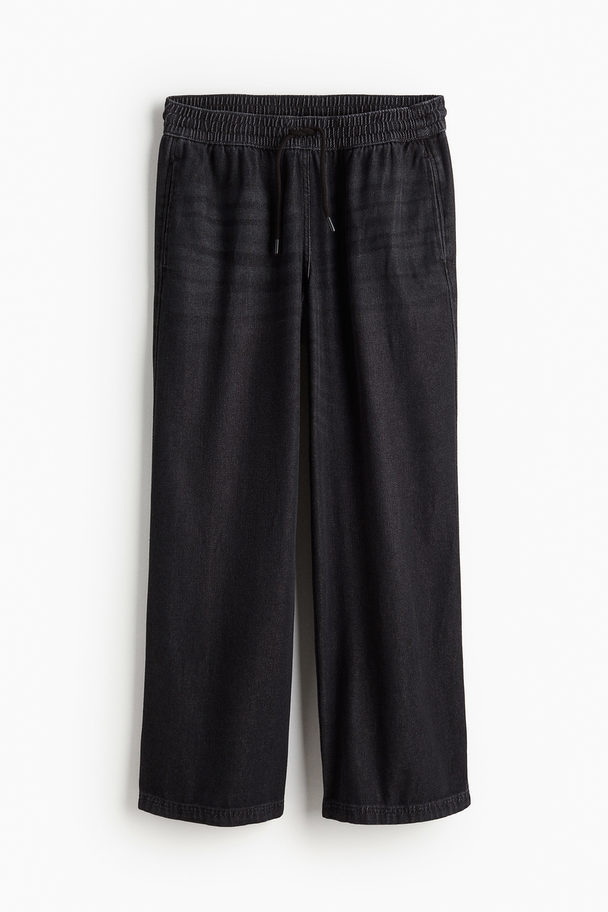 H&M Schlupfhose aus Denim Schwarz