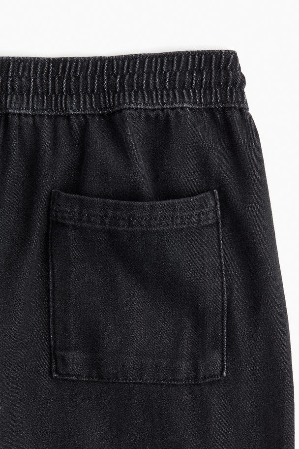 H&M Schlupfhose aus Denim Schwarz