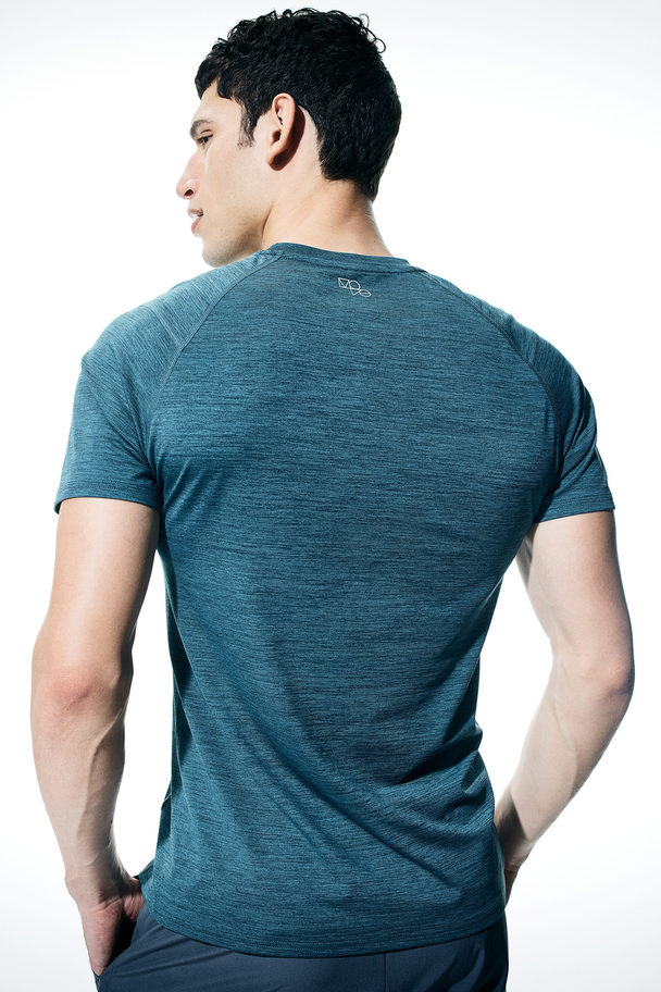 H&M Drymove™ Muscle Fit Pro Trenings-t-shirt Mørk Turkismelert